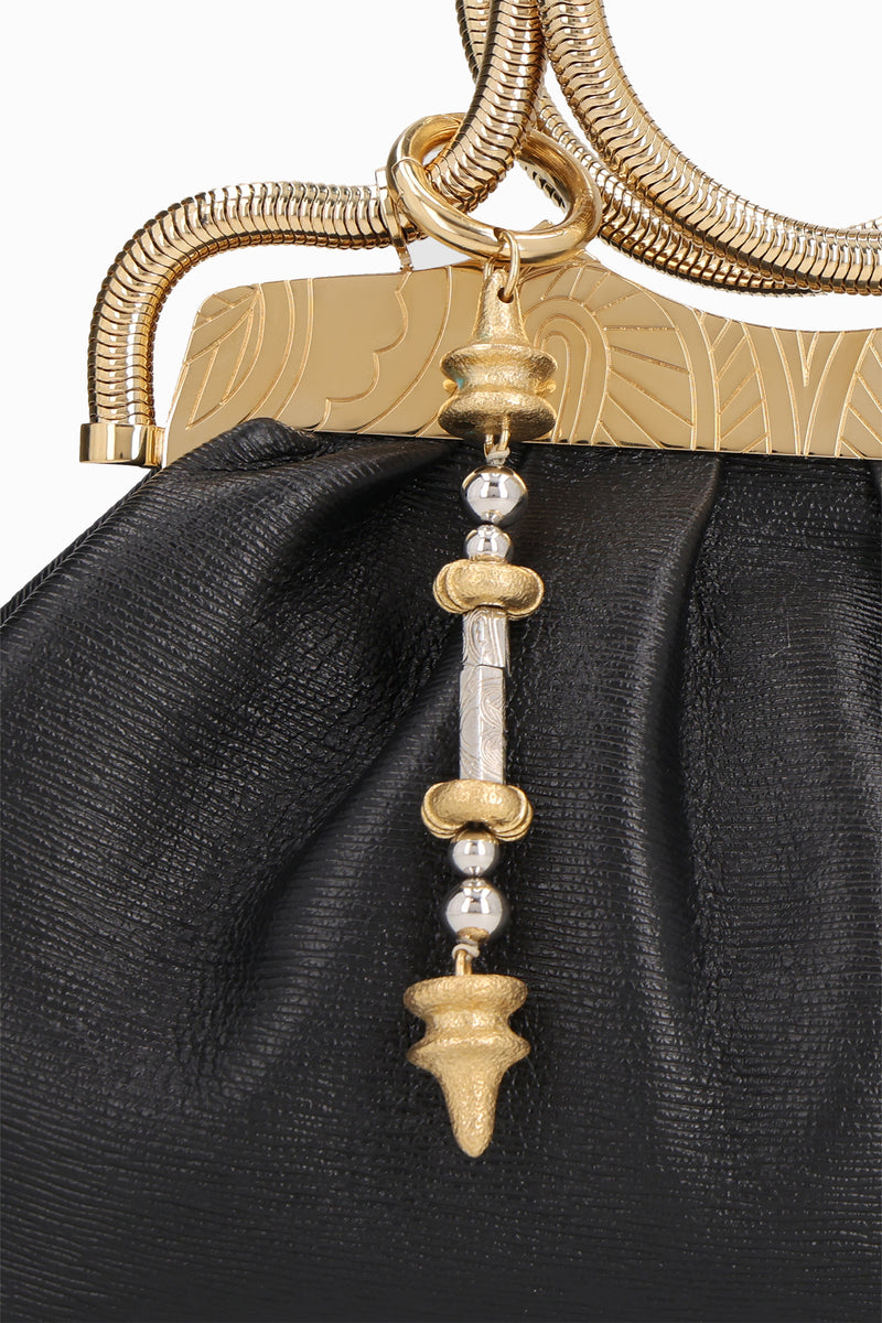 Dancing rod charm